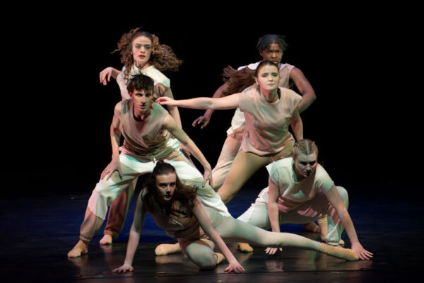 A group of students perform a jazz dance piece